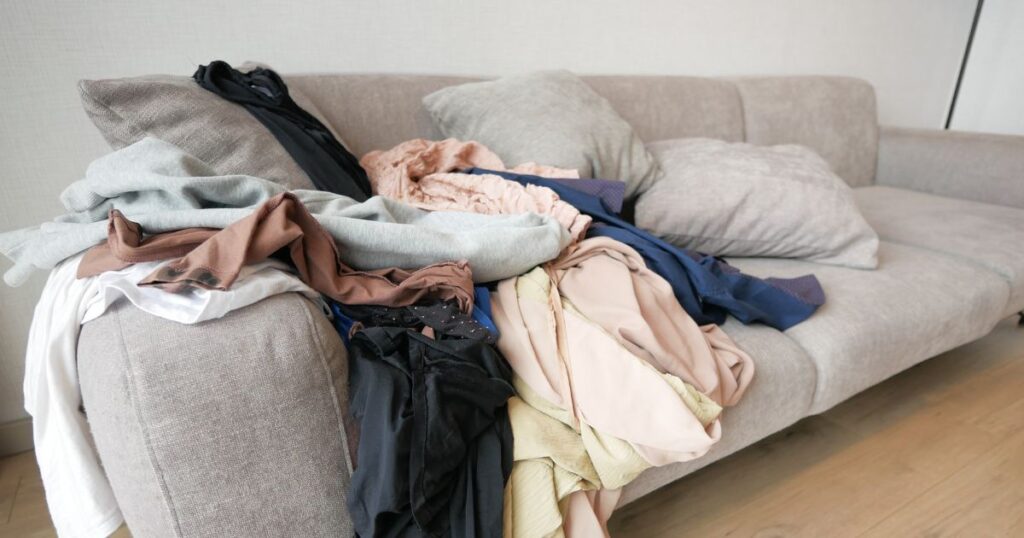 laundry-piled-up-on-the-sofa