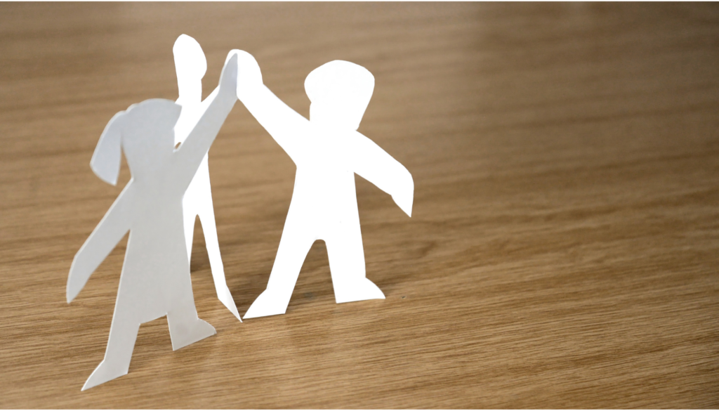 Paper-dolls-holding-hands